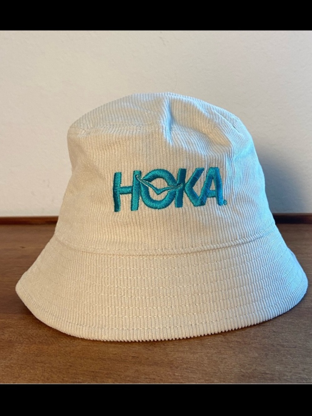 Hoka Cream Bucket Hat with Teal Logo